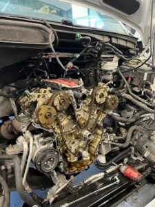 Exposed timing components on a Ford Transit 3.7L V6 during diagnosis and timing-system repair at Chuck's Auto Repair – Shoreline.
