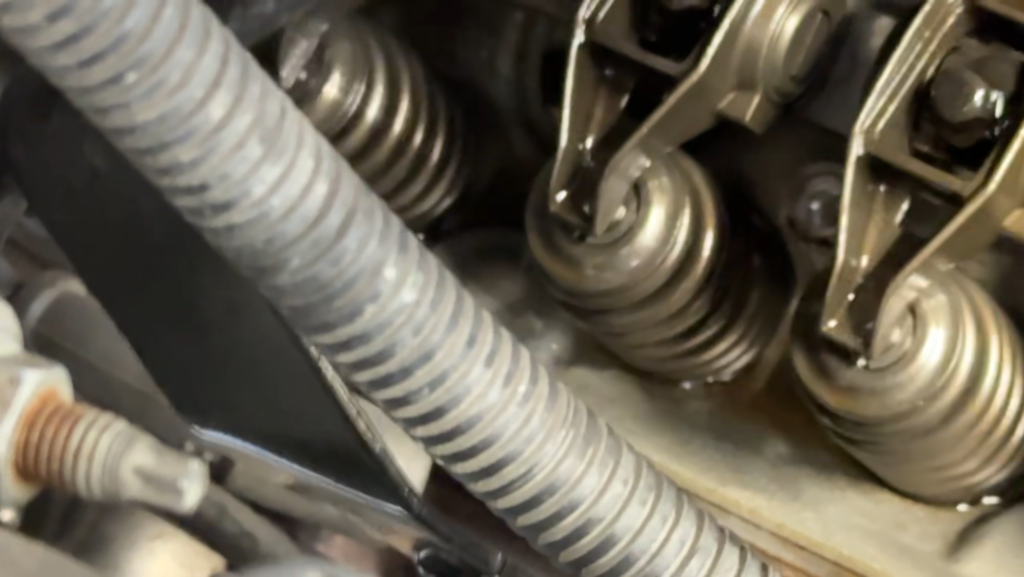 Valvetrain exposed on a Chevrolet Silverado 5.3L during mechanical misfire diagnosis.