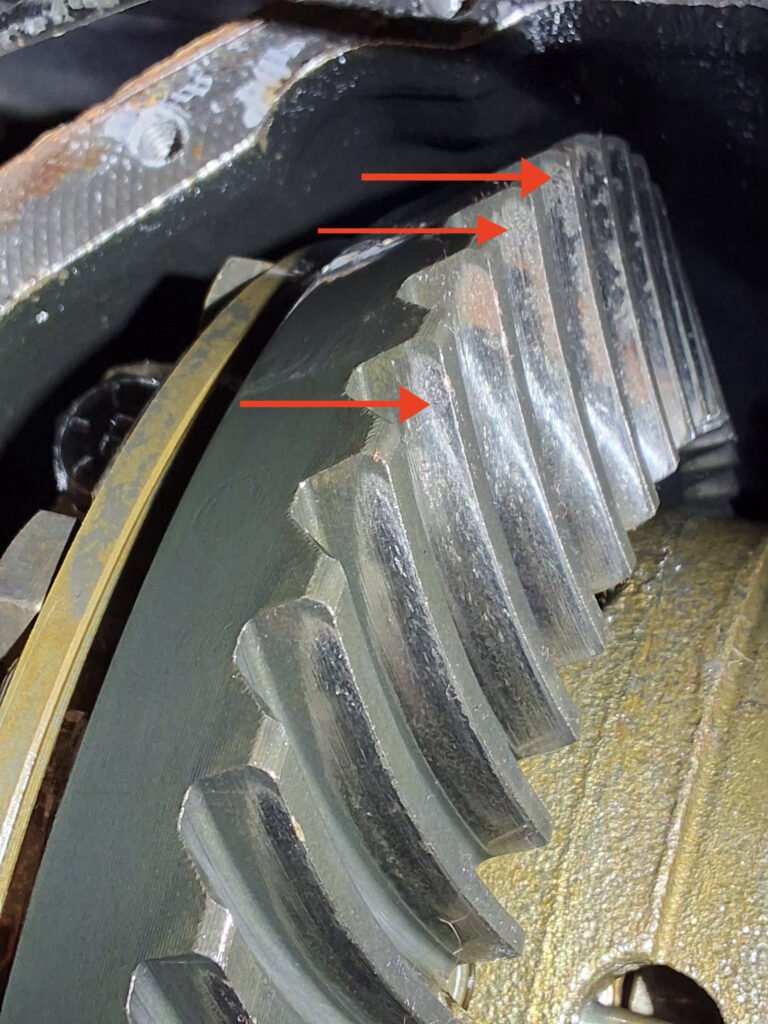 Visible pitting on the ring gear inside a Nissan Xterra rear differential.
